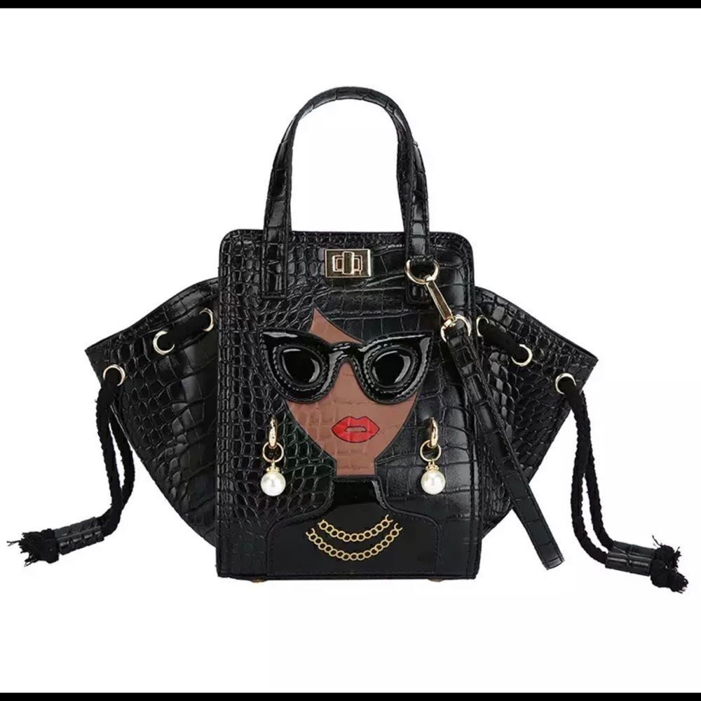 Lady in black handbag